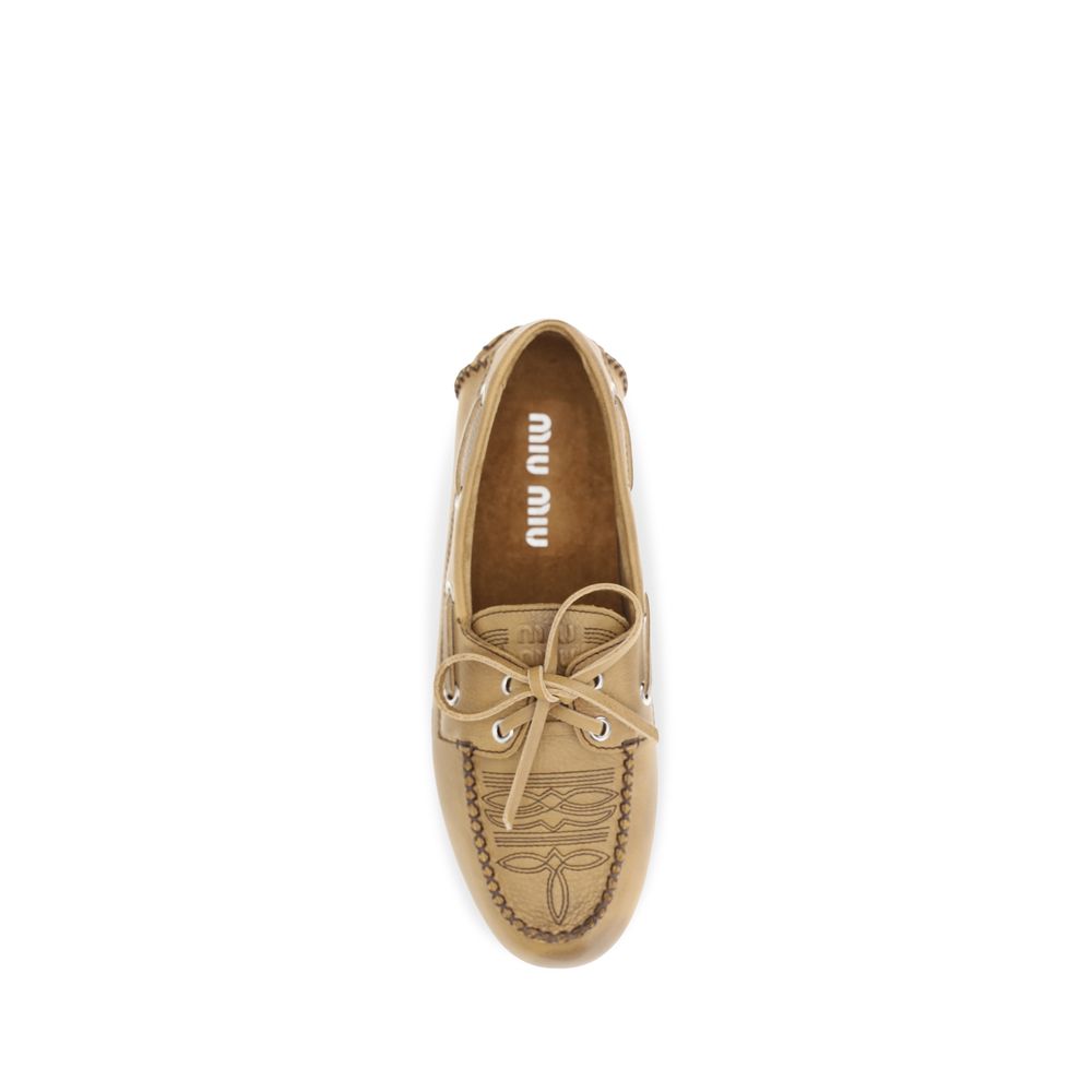 Miu Miu Beige Kalbsleder Bos Taurus Slipper-Loafer – Produktansicht 4 | Arca Lucia