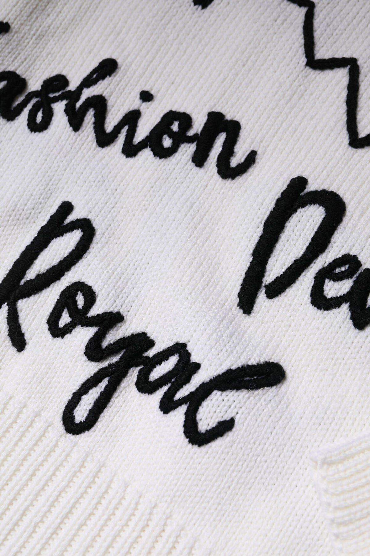 Dolce & Gabbana Weiß-schwarzer Rundhalspullover aus Wolle