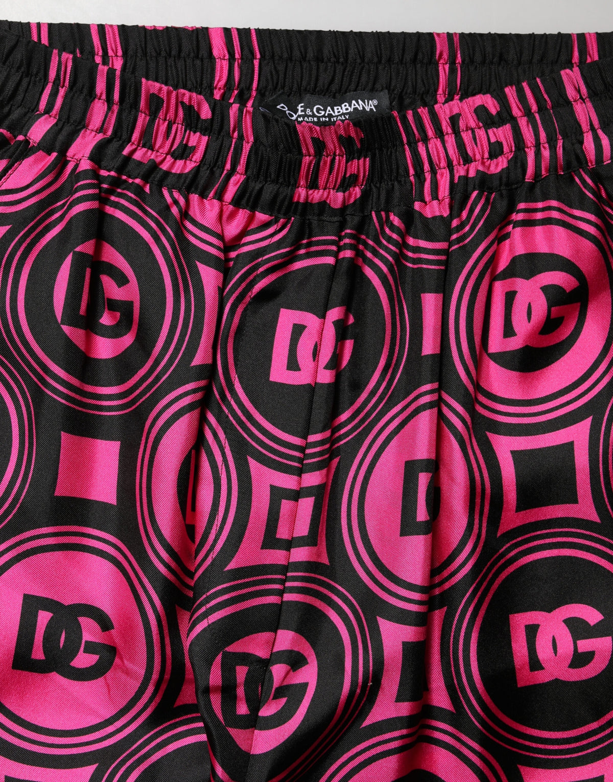 Dolce & Gabbana Schwarz-fuchsia Seidenshorts mit Logo-Print