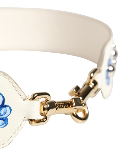 Dolce & Gabbana Schulterriemen aus weißem Leder mit blauem Blumenmuster und Nieten