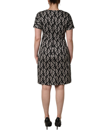 Dolce & Gabbana Schwarzes Kleid aus Baumwolle mit Logo-Print, knielang