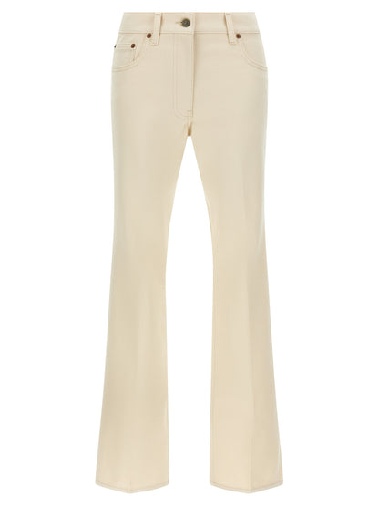 Jeans a zampa d'elefante in cotone beige di Valentino Garavani