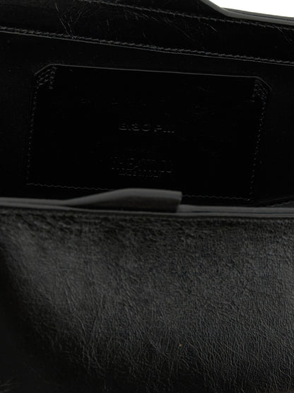 The Attico Schwarze Kalbsleder-Clutch