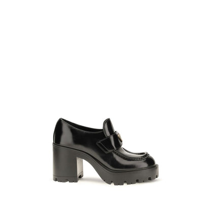 Prada Schwarze Bos Taurus Kalbsleder Plateau-Loafer