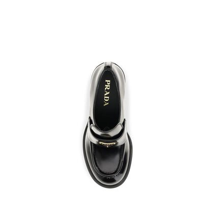 Prada Schwarze Bos Taurus Kalbsleder Plateau-Loafer