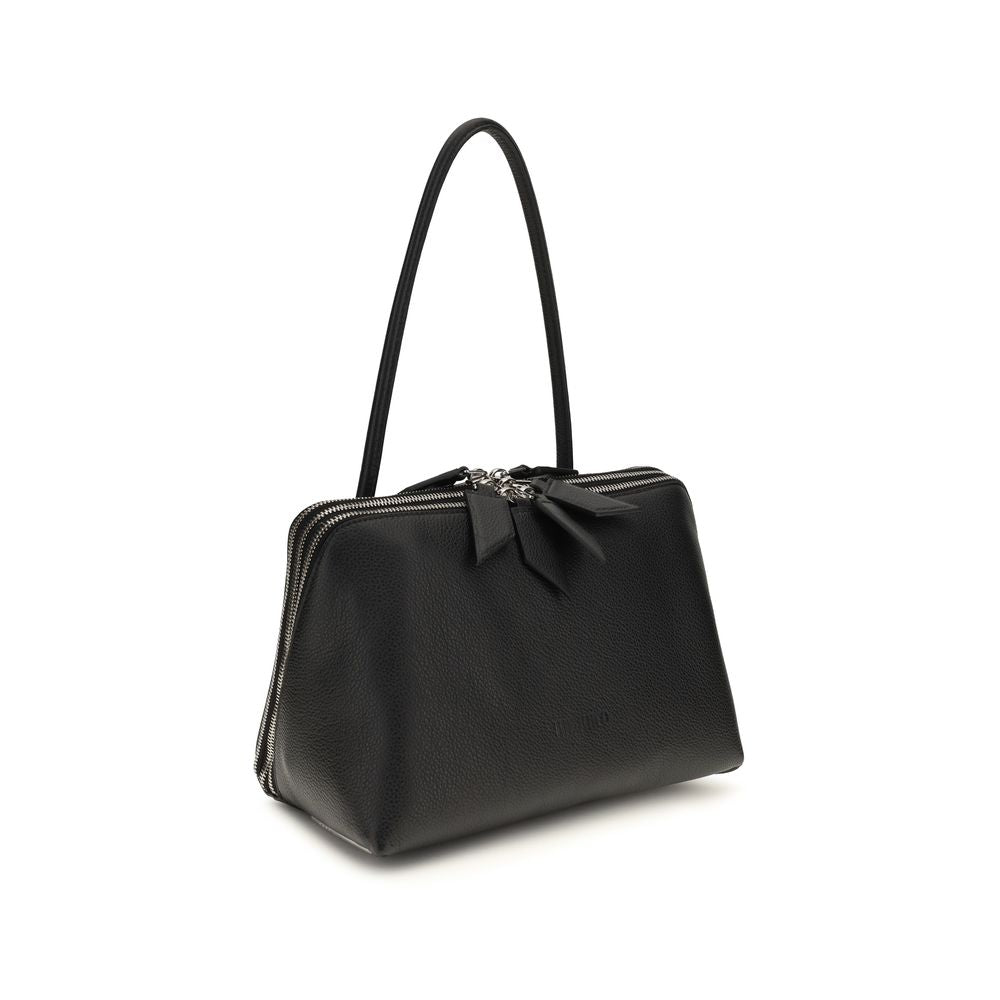 The Attico Schultertasche aus Lackleder in Schwarz