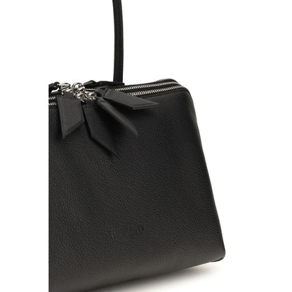 The Attico Schultertasche aus Lackleder in Schwarz