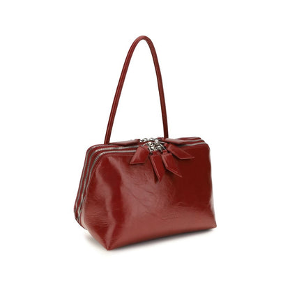 The Attico Schultertasche aus Lackleder in Rot
