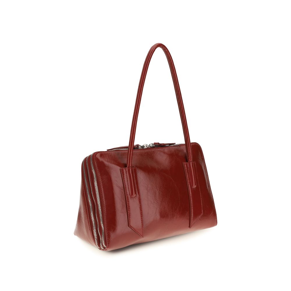 The Attico Schultertasche aus Lackleder in Rot