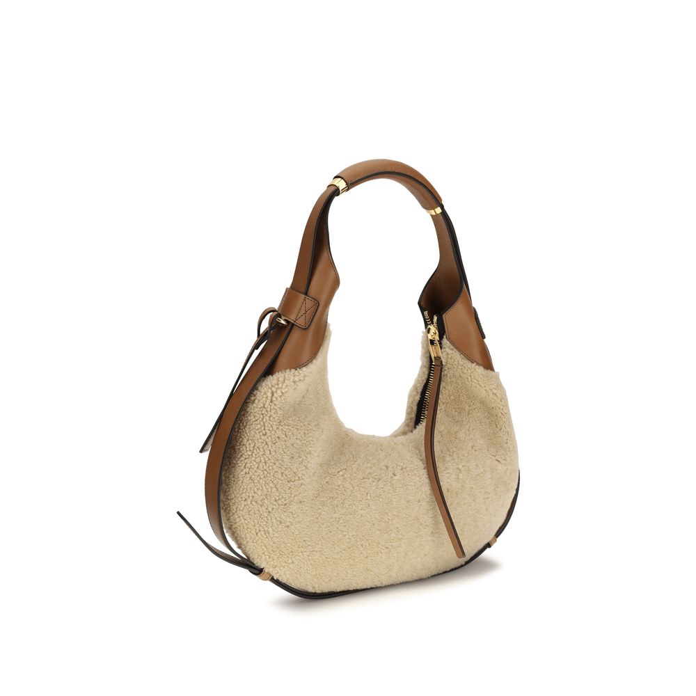 Moschino Schultertasche aus Leder in Beige