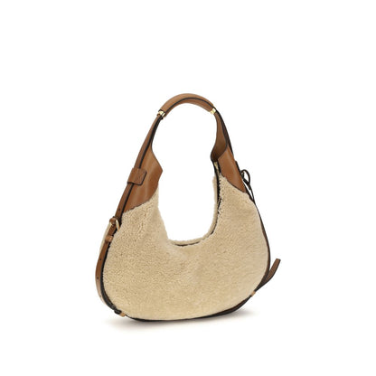 Moschino Schultertasche aus Leder in Beige