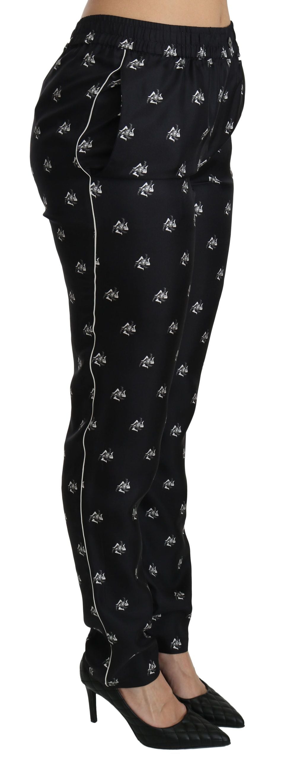 Dolce & Gabbana Schwarze bedruckte Skinny-Hose aus Seide mit mittlerer Taille