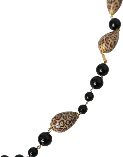 Dolce & Gabbana Goldfarbene lange Halskette mit schwarzen Perlen