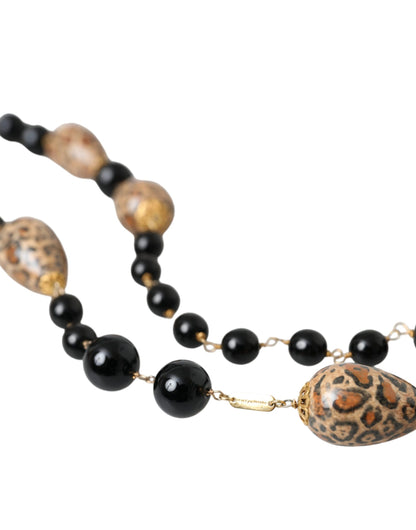 Dolce & Gabbana Goldfarbene lange Halskette mit schwarzen Perlen