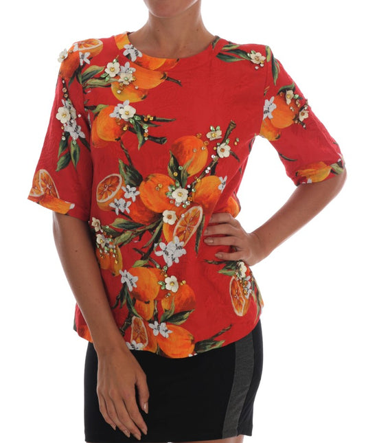 Dolce & Gabbana Orangefarbene Bluse mit Kristallverzierung
