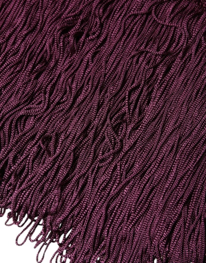 Dolce & Gabbana Schwarzes gepunktetes Midikleid aus Seide mit V-Ausschnitt und Quasten
