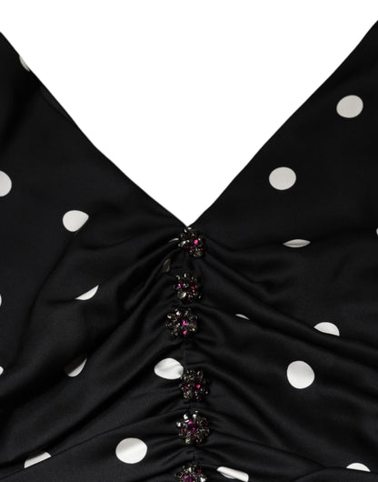 Dolce & Gabbana Schwarzes gepunktetes Midikleid aus Seide mit V-Ausschnitt und Quasten