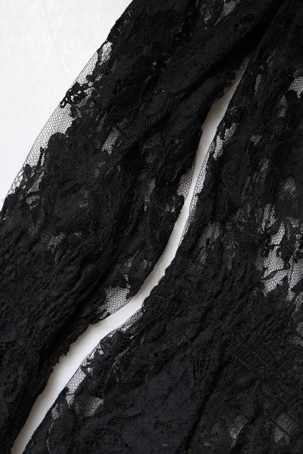Dolce & Gabbana Schwarze Langarmbluse aus floraler Spitze