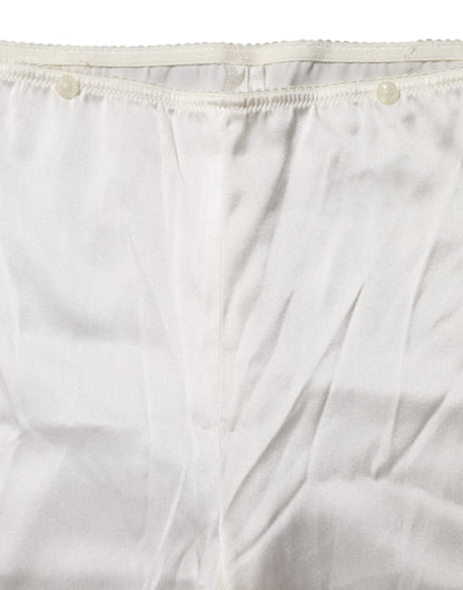 Dolce & Gabbana Elfenbeinfarbene konisch zulaufende Seidenhose mit hoher Taille
