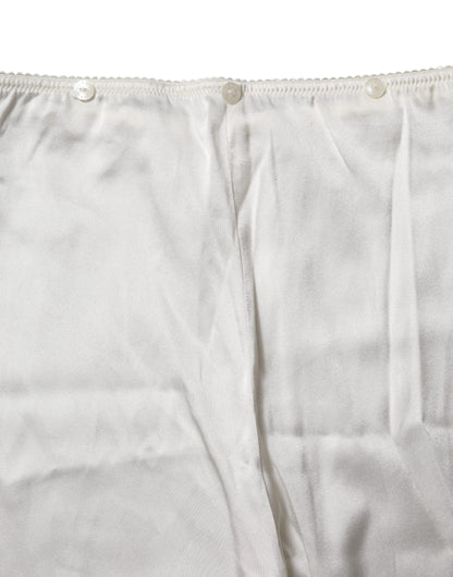Dolce & Gabbana Elfenbeinfarbene konisch zulaufende Seidenhose mit hoher Taille