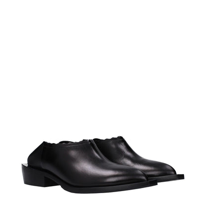 Moschino Schwarze Mules aus Leder
