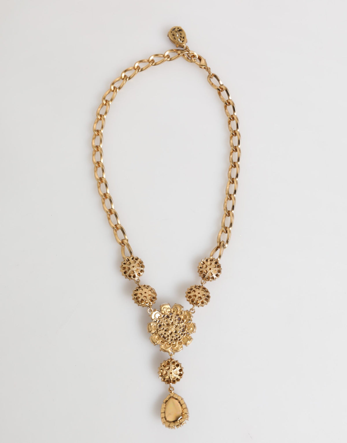 Dolce & Gabbana Goldfarbene Halskette mit violettem Kristall-Blumenanhänger