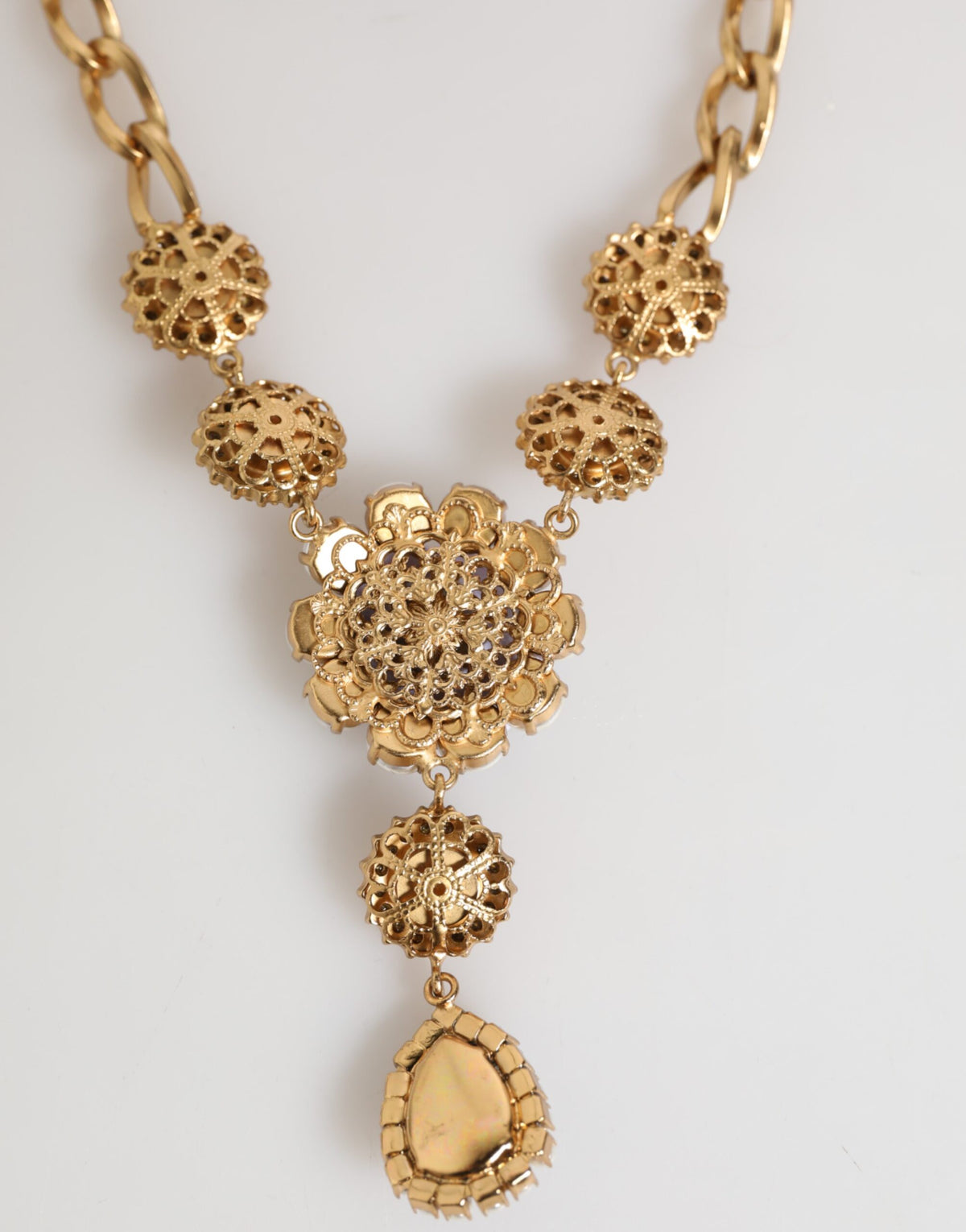 Dolce & Gabbana Goldfarbene Halskette mit violettem Kristall-Blumenanhänger