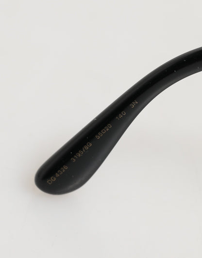 Dolce & Gabbana Sonnenbrille mit Schmetterlingsrahmen, Schwarz und Silber mit Pailletten